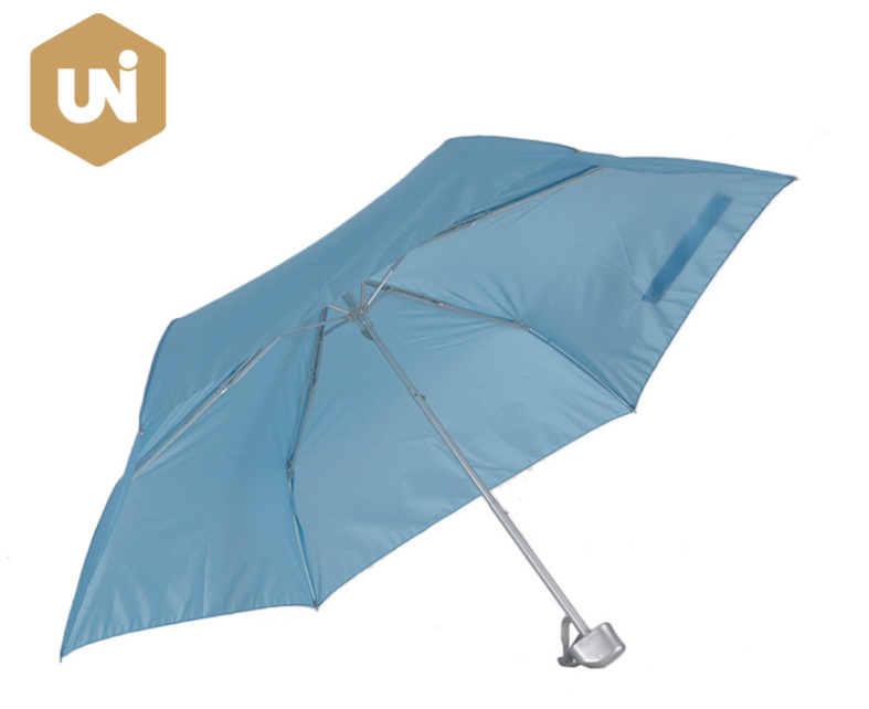 Um guarda-chuva – um dispositivo para proteger o sol e a chuva